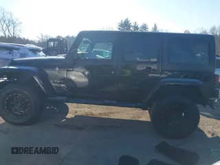 2018 Jeep Wrangler JK Unlimited Sahara with VIN 1C4HJWEG8JL921293, listed as a IAAI auction lot 41413264 with 90,566 mi miles. Bid and sale history available at carsss.com. Image 15.