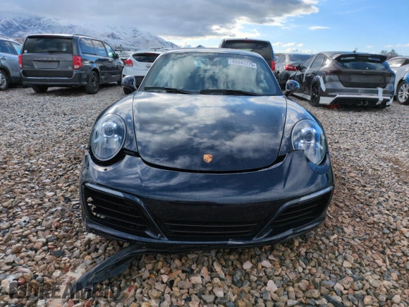 2017 Porsche 911 Carrera with VIN WP0AA2A96HS107967, listed as a Copart auction lot 48043775 with 57,235 mi miles and Salvage Title. Bid and sale history available at carsss.com. Image 5.