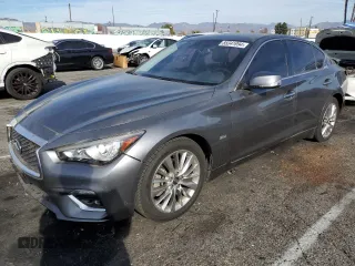 2019 Infiniti Q50 Sport with VIN JN1EV7AP0KM516899, listed as a Copart auction lot 85341994 with 96,786 mi miles and Salvage title. Bid and sale history available at DreamBid. Image 1.