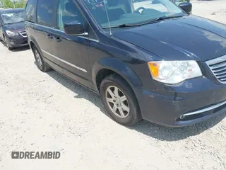 2011 Chrysler Town & Country Touring with VIN 2A4RR5DG7BR697932, listed as a IAAI auction lot 42231254 with 151,866 mi miles and . Bid and sale history available at DreamBid. Image 6.
