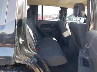 2012 Jeep Liberty Sport with VIN 1C4PJLAK9CW159310, listed as a IAAI auction lot 41987331 with 204,132 mi miles and . Bid and sale history available at carsss.com. Image 8.