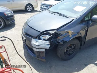 2012 Toyota Prius One z VIN JTDKN3DU6C1504544, wystawiony jako IAAI lot #42128634 z przebiegiem 298 344 mil mil oraz . Historia ofert i sprzedaży dostępna na DreamBid. Obrazek 6.
