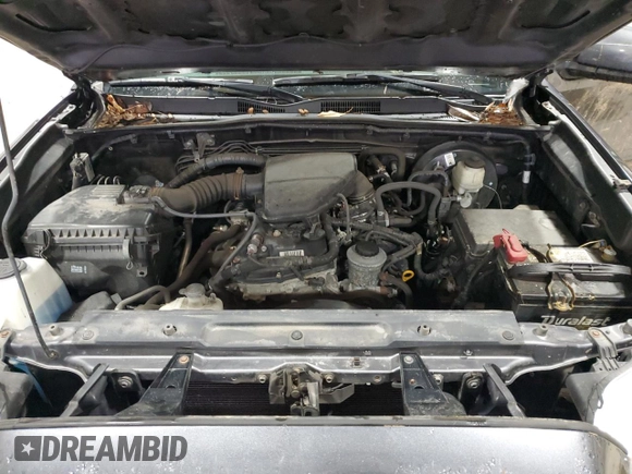 2018 Toyota Tacoma SR z VIN 5TFSX5EN1JX058679, wystawiony jako Copart lot #45236605 z przebiegiem 106 306 mil mil oraz Szkoda całkowita • Salvage title. Historia ofert i sprzedaży dostępna na DreamBid. Obrazek 13.