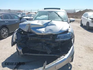 2019 Volkswagen Tiguan SEL Premium with VIN 3VV4B7AX5KM085435, listed as a IAAI auction lot 41839386 with 124,501 mi miles and . Bid and sale history available at DreamBid. Image 6.