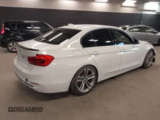 2018 BMW 3 Series 330i xDrive with VIN WBA8D9G56JNU72833, listed as a IAAI auction lot 41287671 with 93,529 mi miles. Bid and sale history available at carsss.com. Image 4.