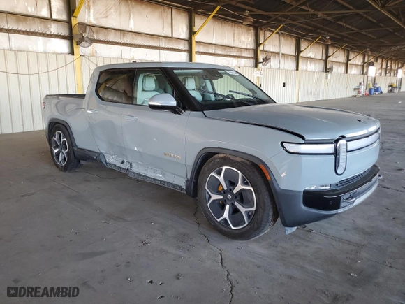 2022 Rivian R1T Adventure Package with VIN 7FCTGAAA3NN014291, listed as a Copart auction lot 76587044 with 0 mi miles and Salvage Title. Bid and sale history available at carsss.com. Image 4.