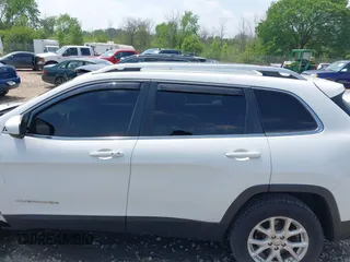 2016 Jeep Cherokee Latitude with VIN 1C4PJMCB8GW148470, listed as a IAAI auction lot 42415483 with 146,427 mi miles and . Bid and sale history available at DreamBid. Image 15.