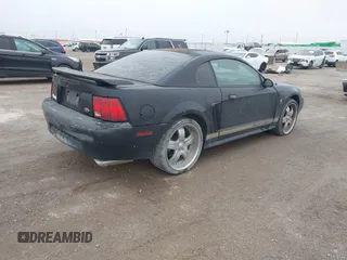 2002 Ford Mustang Standard z VIN 1FAFP40452F142303, wystawiony jako IAAI lot #41557652 z przebiegiem Nie podano mil oraz . Historia ofert i sprzedaży dostępna na DreamBid. Obrazek 4.