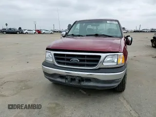 2002 Ford F-150 XL with VIN 1FTRX17W92KA57890, listed as a Copart auction lot 46894115 with 169,725 mi miles and Salvage Title. Bid and sale history available at carsss.com. Image 11.