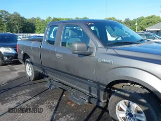 2015 Ford F-150 XLT with VIN 1FTEX1EP7FKE96165, listed as a IAAI auction lot 42262766 with 260,250 mi miles and . Bid and sale history available at DreamBid. Image 13.