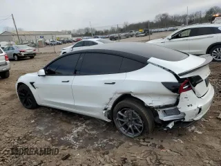 2022 Tesla Model 3 Long Range with VIN 5YJ3E1EB4NF164276, listed as a Copart auction lot 45802865 with 56,836 mi miles and Salvage Title. Bid and sale history available at DreamBid. Image 2.