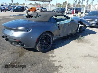 2024 Aston Martin DB12 z VIN SCFRMFGWXRGM13607, wystawiony jako IAAI lot #41380304 z przebiegiem Nie podano mil oraz . Historia ofert i sprzedaży dostępna na DreamBid. Obrazek 4.