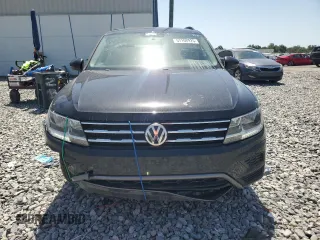 2021 Volkswagen Tiguan S z VIN 3VV1B7AX2MM020872, wystawiony jako Copart lot #57106925 z przebiegiem 92 908 mil mil oraz Tytuł czysty. Historia ofert i sprzedaży dostępna na DreamBid. Obrazek 5.