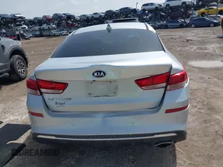 2019 Kia Optima LX z VIN 5XXGT4L37KG281329, wystawiony jako IAAI lot #42434855 z przebiegiem 113 448 mil mil oraz . Historia ofert i sprzedaży dostępna na DreamBid. Obrazek 16.