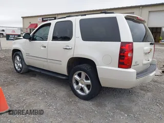 2014 Chevrolet Tahoe LTZ z VIN 1GNSCCE05ER101331, wystawiony jako IAAI lot #41793150 z przebiegiem 177 769 mil mil oraz . Historia ofert i sprzedaży dostępna na DreamBid. Obrazek 3.