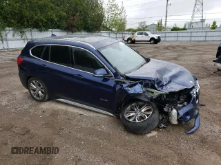 2018 BMW X1 xDrive28i with VIN WBXHT3C35J5F88893, listed as a Copart auction lot 58032725 with 143,968 mi miles and Salvage title. Bid and sale history available at DreamBid. Image 4.
