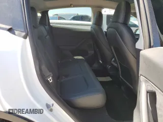 2022 Tesla Model Y Long Range with VIN 7SAYGDEE7NA012634, listed as a Copart auction lot 49206295 with 19,267 mi miles and Clean Title. Bid and sale history available at DreamBid. Image 10.