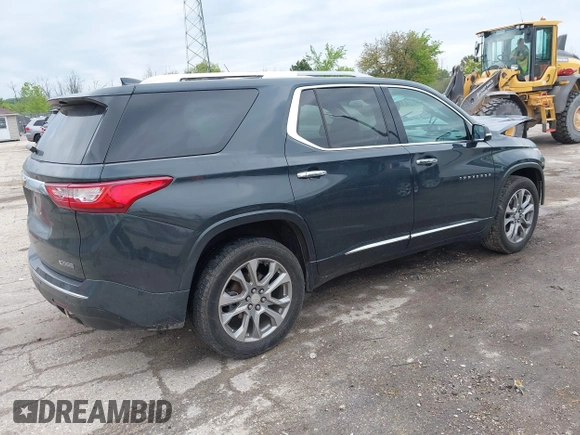 2018 Chevrolet Traverse Premier z VIN 1GNEVJKW4JJ240024, wystawiony jako IAAI lot #42369659 z przebiegiem 160 147 mil mil oraz . Historia ofert i sprzedaży dostępna na DreamBid. Obrazek 4.