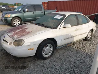 1997 Ford Taurus GL z VIN 1FALP52UXVA107778, wystawiony jako IAAI lot #42069491 z przebiegiem 57 736 mil mil oraz . Historia ofert i sprzedaży dostępna na DreamBid. Obrazek 2.