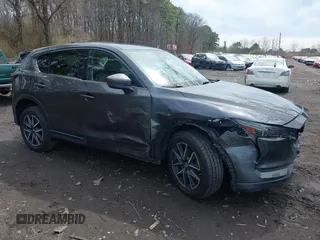 2018 Mazda CX-5 Grand Touring with VIN JM3KFBDM6J0388540, listed as a IAAI auction lot 41963726 with 103,148 mi miles. Bid and sale history available at carsss.com. Image 1.