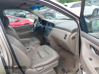 2004 Honda Odyssey EX-L z VIN 5FNRL18024B079462, wystawiony jako IAAI lot #42227175 z przebiegiem 267 661 mil mil oraz . Historia ofert i sprzedaży dostępna na DreamBid. Obrazek 5.
