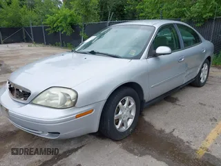 2002 Mercury Sable GS z VIN 1MEFM50U52G650143, wystawiony jako IAAI lot #42525337 z przebiegiem 151 079 mil mil oraz . Historia ofert i sprzedaży dostępna na DreamBid. Obrazek 2.