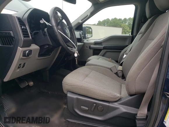 2020 Ford F-150 XL with VIN 1FTEW1E57LFA26918, listed as a Copart auction lot 57839875 with 91,703 mi miles and Salvage title. Bid and sale history available at DreamBid. Image 7.