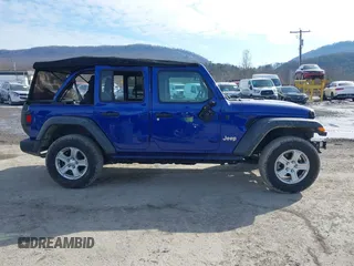 2020 Jeep Wrangler Unlimited Sport S z VIN 1C4HJXDG2LW260238, wystawiony jako IAAI lot #41415820 z przebiegiem 62 224 mil mil oraz . Historia ofert i sprzedaży dostępna na DreamBid. Obrazek 14.