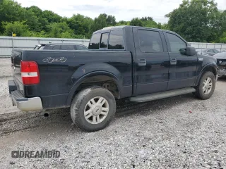 2004 Ford F-150 XLT with VIN 1FTPW14574KB96621, listed as a Copart auction lot 61137655 with 220,659 mi miles and Salvage title. Bid and sale history available at DreamBid. Image 3.