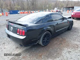 2006 Ford Mustang GT Deluxe with VIN 1ZVFT82H165131045, listed as a IAAI auction lot 41898142 with 124,643 mi miles and . Bid and sale history available at DreamBid. Image 4.
