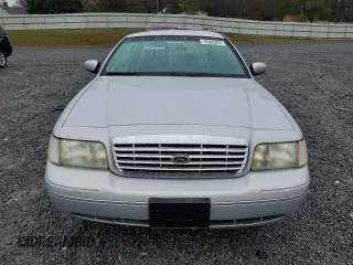 1999 Ford Crown Victoria Police with VIN 2FAFP71W8XX237354, listed as a Copart auction lot 79340304 with 198,482 mi miles and Salvage Title. Bid and sale history available at carsss.com. Image 5.