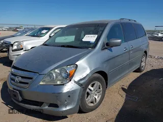 2007 Honda Odyssey EX-L with VIN 5FNRL386X7B138990, listed as a IAAI auction lot 41823648 with 225,962 mi miles. Bid and sale history available at carsss.com. Image 2.