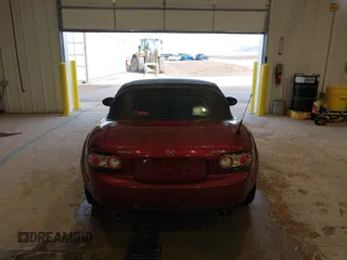 2007 Mazda MX-5 Miata Sport z VIN JM1NC25F970132299, wystawiony jako IAAI lot #41622791 z przebiegiem 72 392 mil mil oraz . Historia ofert i sprzedaży dostępna na DreamBid. Obrazek 17.