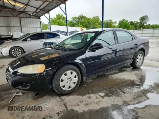 2002 Dodge Stratus SE z VIN 1B3EL36R02N198011, wystawiony jako Copart lot #58213505 z przebiegiem 104 464 mil mil oraz Tytuł czysty. Historia ofert i sprzedaży dostępna na DreamBid. Obrazek 1.