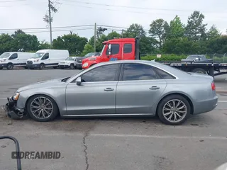 2011 Audi A8 with VIN WAUAVAFD0BN018197, listed as a IAAI auction lot 42221435 with 74,465 mi miles and . Bid and sale history available at DreamBid. Image 15.
