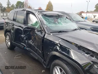 2023 Jeep Grand Cherokee Laredo with VIN 1C4RJHAG6PC671728, listed as a IAAI auction lot 40897386 with Not provided miles and . Bid and sale history available at DreamBid. Image 6.