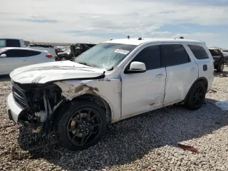 2015 Dodge Durango Special Service with VIN 1C4SDJFT1FC743049, listed as a Copart auction lot 60161544 with 137,763 mi miles and Salvage title. Bid and sale history available at DreamBid. Image 1.