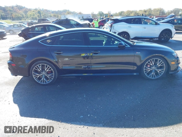 2016 Audi A7 Prestige z VIN WAU2GAFC5GN169534, wystawiony jako IAAI lot #40802384 z przebiegiem 103 263 mil mil oraz . Historia ofert i sprzedaży dostępna na DreamBid. Obrazek 13.