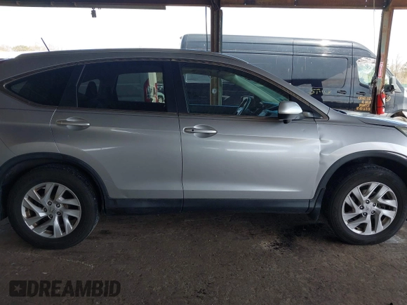 2015 Honda CR-V EX-L with VIN 2HKRM4H72FH616198, listed as a IAAI auction lot 42038752 with 82,826 mi miles and . Bid and sale history available at carsss.com. Image 12.
