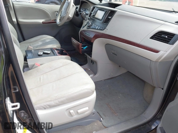 2013 Toyota Sienna XLE with VIN 5TDDK3DC9DS064154, listed as a IAAI auction lot 41898401 with 175,013 mi miles and . Bid and sale history available at DreamBid. Image 5.