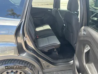 2016 Ford Escape SE with VIN 1FMCU9G91GUB49042, listed as a Copart auction lot 56257705 with 235,024 mi miles and Clean Title. Bid and sale history available at DreamBid. Image 6.