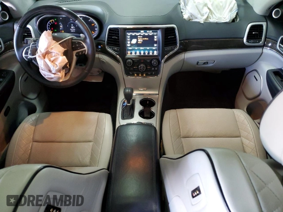 2018 Jeep Grand Cherokee Summit with VIN 1C4RJFJT5JC273869, listed as a Copart auction lot 57482865 with 70,843 mi miles and Salvage title. Bid and sale history available at DreamBid. Image 8.