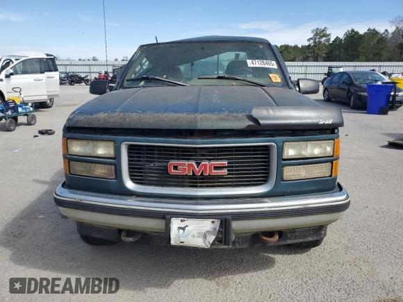 1995 GMC Sierra 1500 z VIN 2GTEK19K1S1561454, wystawiony jako Copart lot #47128465 z przebiegiem 178 963 mil mil oraz Szkody całkowita. Historia ofert i sprzedaży dostępna na DreamBid. Obrazek 5.