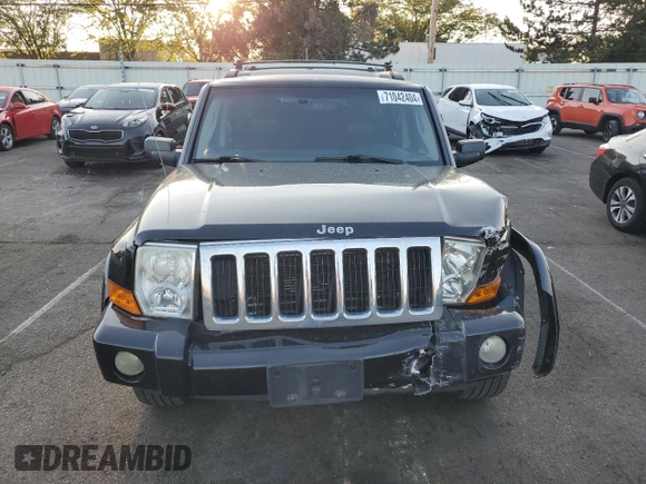 2008 Jeep Commander Limited with VIN 1J8HH58N98C236772, listed as a Copart auction lot 71042404 with 217,780 mi miles and Salvage title. Bid and sale history available at DreamBid. Image 5.