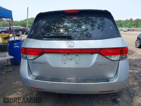 2014 Honda Odyssey Touring with VIN 5FNRL5H97EB054158, listed as a IAAI auction lot 42548360 with 91,161 mi miles and . Bid and sale history available at DreamBid. Image 16.