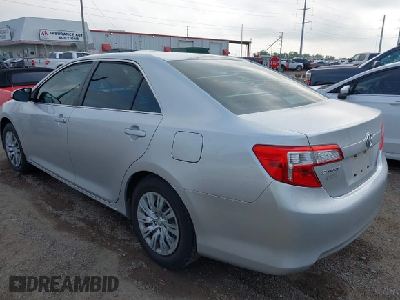 2012 Toyota Camry L with VIN 4T1BF1FK8CU080078, listed as a IAAI auction lot 42084382 with 165,894 mi miles and . Bid and sale history available at carsss.com. Image 3.
