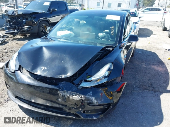 2018 Tesla Model 3 Long Range Battery with VIN 5YJ3E1EB9JF183920, listed as a IAAI auction lot 41657742 with 107,358 mi miles and . Bid and sale history available at DreamBid. Image 6.