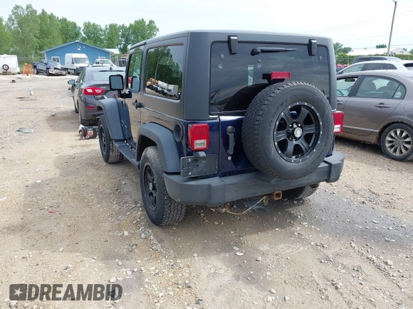 2013 Jeep Wrangler Sport with VIN 1C4AJWAG2DL505655, listed as a IAAI auction lot 42557213 with 185,502 mi miles and . Bid and sale history available at DreamBid. Image 3.