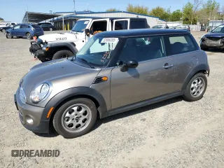 2013 MINI Hardtop with VIN WMWSU3C57DT678736, listed as a Copart auction lot 52586285 with 64,563 mi miles and Salvage Title. Bid and sale history available at DreamBid. Image 1.