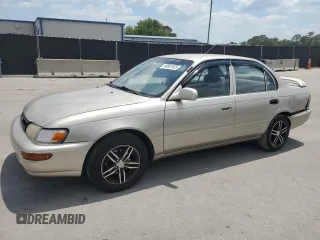 1994 Toyota Corolla with VIN 1NXAE04B0RZ185394, listed as a Copart auction lot 56861925 with 183,843 mi miles and Salvage title. Bid and sale history available at DreamBid. Image 1.